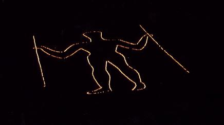 The Long Man illuminated at night